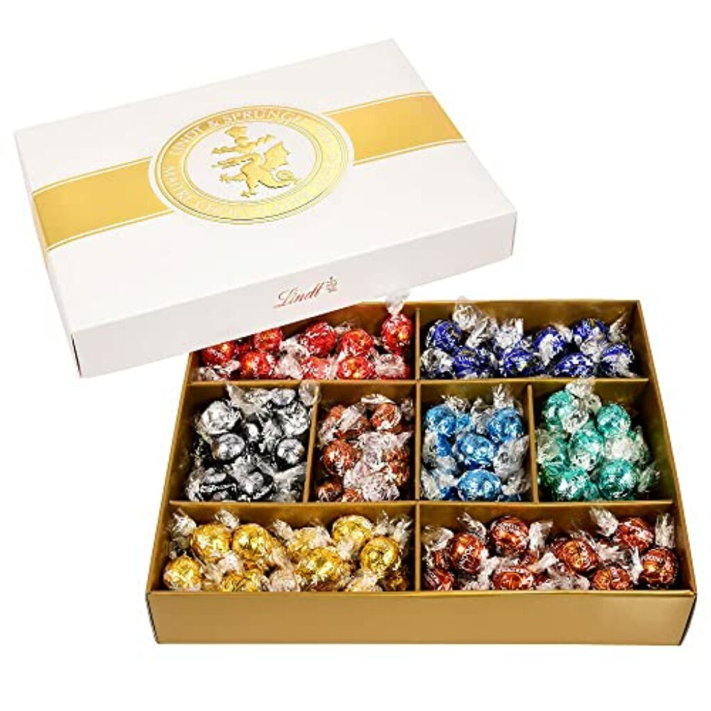 Lindt Schokolade LINDOR Classic Box|1563g|Ca. 125 Kugeln, Sorten: Milch, Dark 60%, Feinherb, Haselnuss,Weiß, Mandelcrème,Stracciatella, Cocos| Pralinen- und Schokoladengeschenk|Großpackung